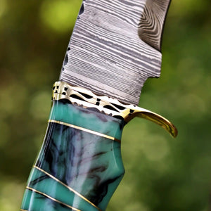Handmade Damascus hunting knife with blue resin handle