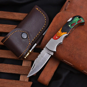 1. Damascus pocket knife handcrafted by artisans