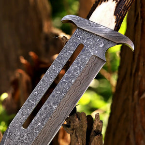 closeup of Damascus raindrop pattern bowie knife