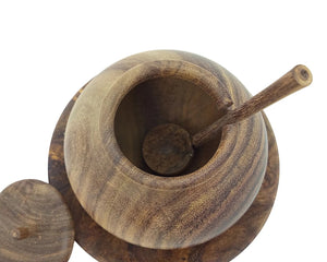 Artisan handcrafted wooden condiment jar with spoon