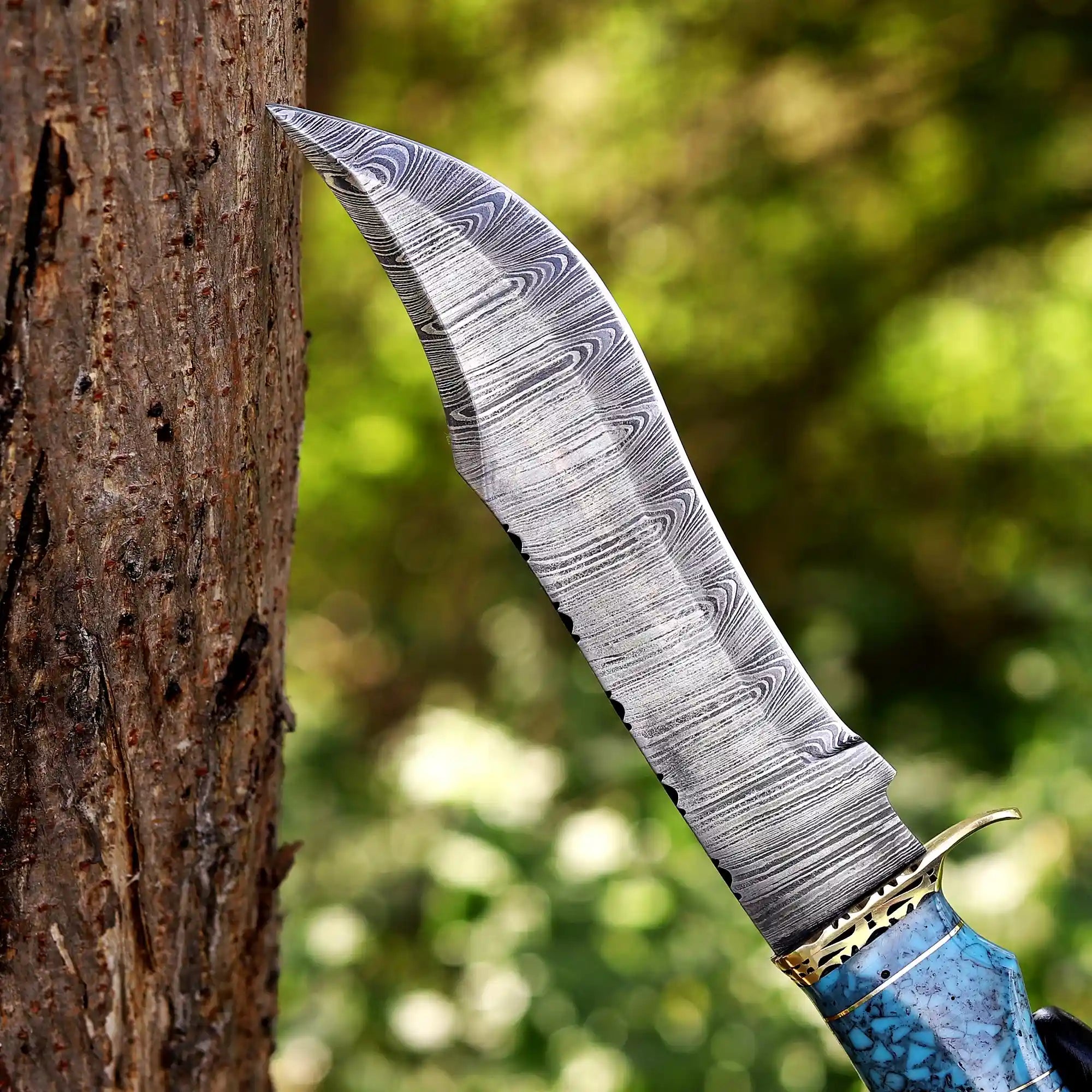 Handmade Damascus hunting knife with blue resin handle