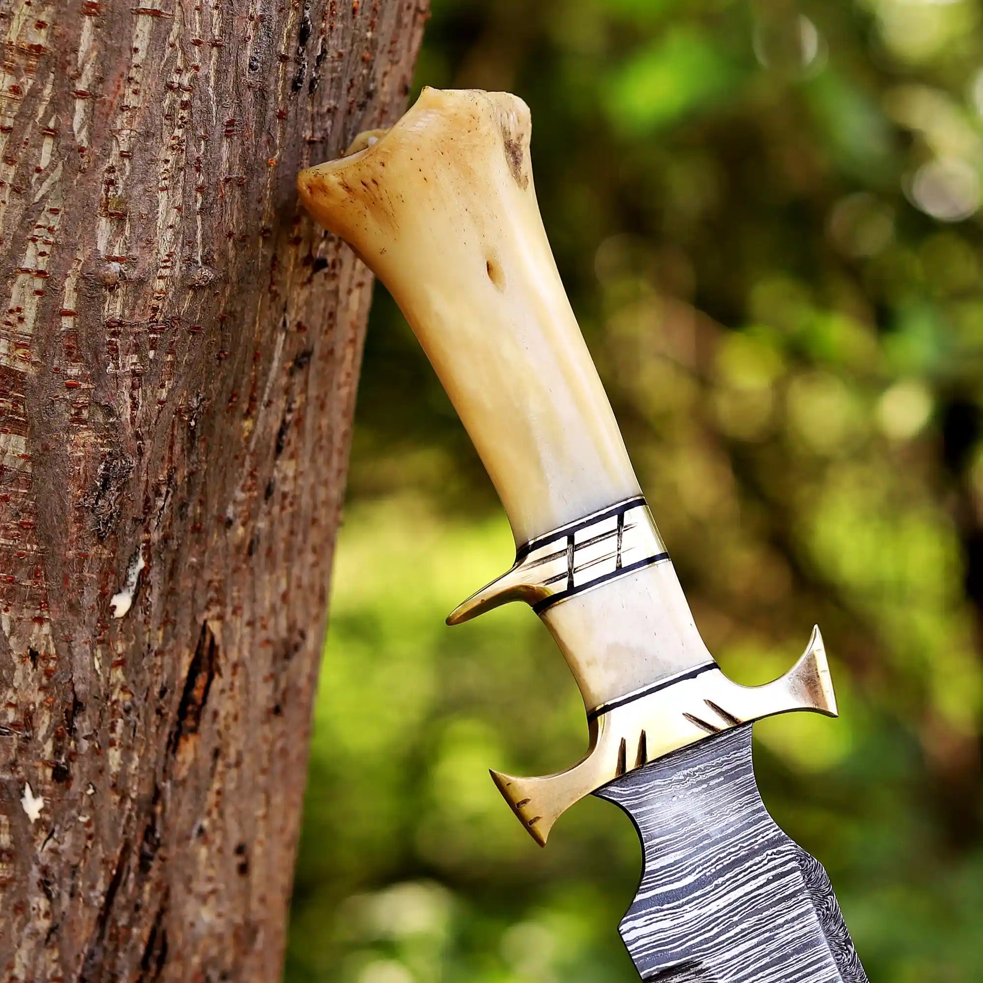 Bone handle Bowie knife crafted by skilled artisans