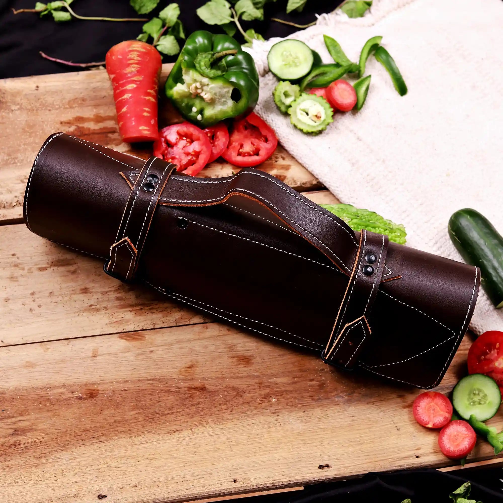 Hand forged Damascus kitchen knives with leather storage roll