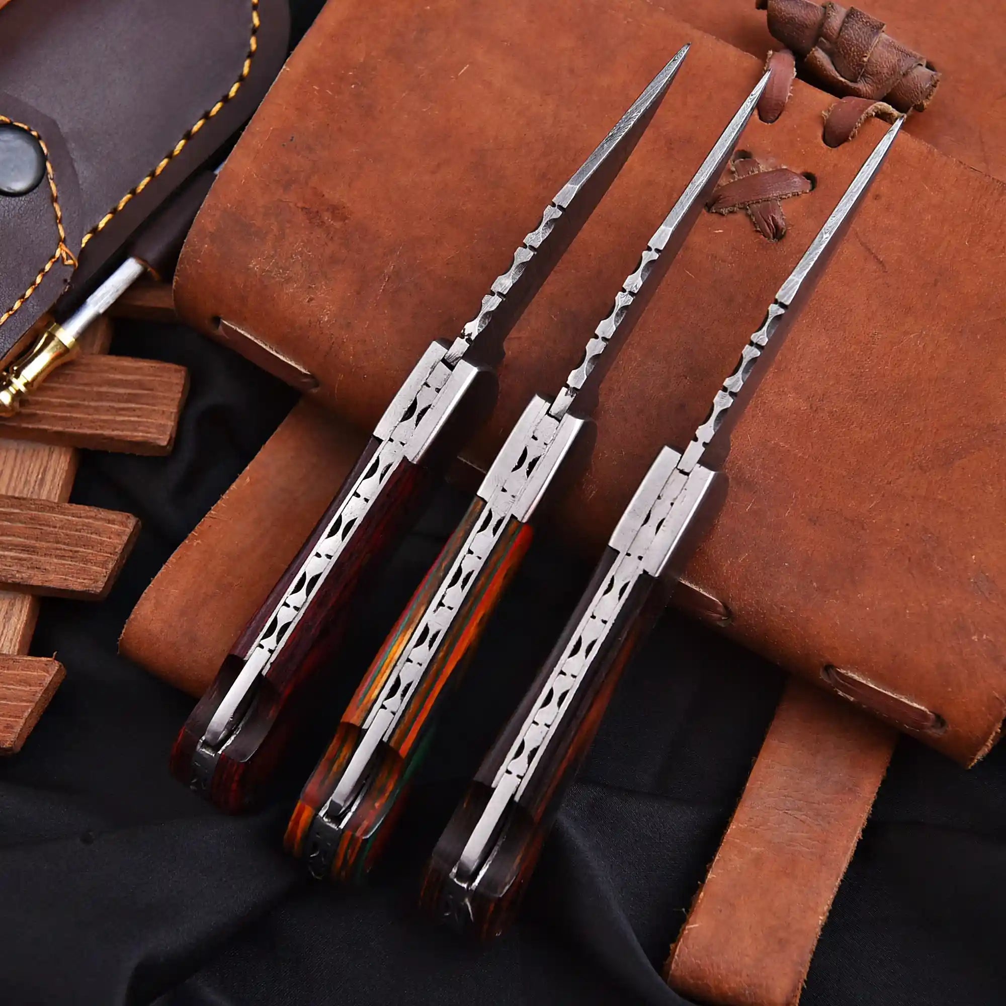 Damascus steel pocket knife handcrafted by artisans
