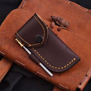 Handmade Damascus steel folding knife with leather sheath