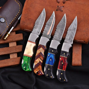 Collector-grade Damascus folding knife close-up